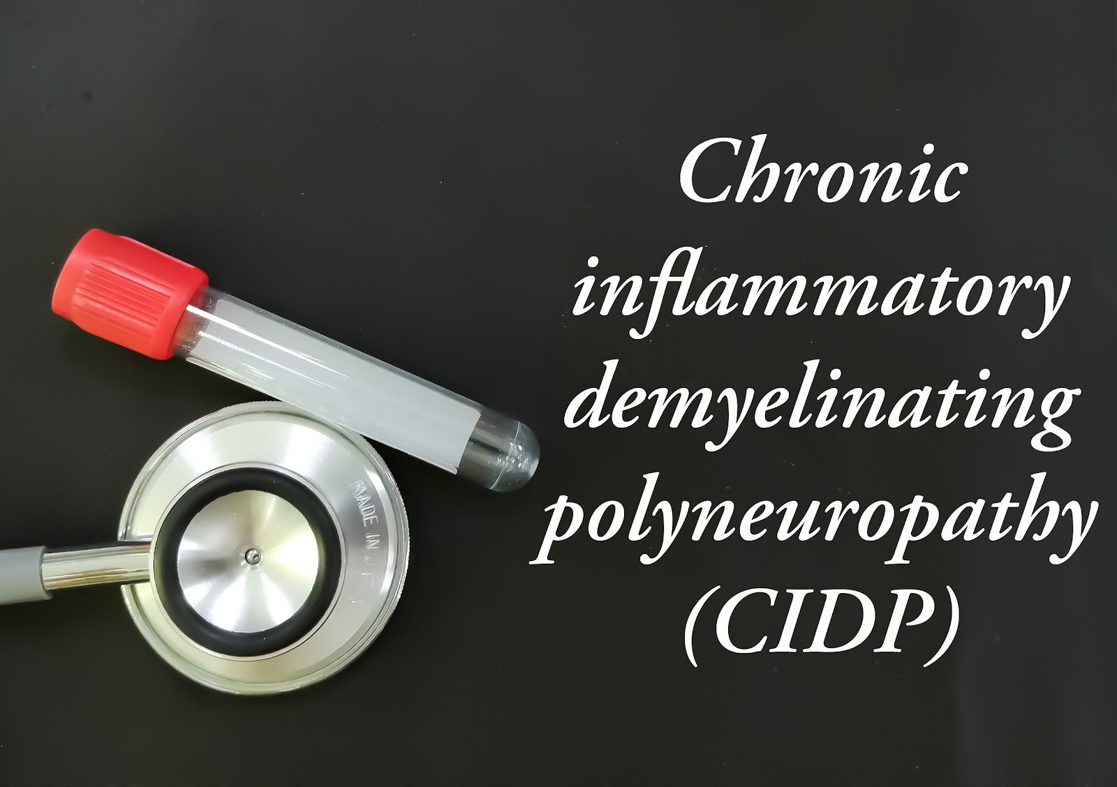 Blood collection tube and a stethoscope arranged on a grey surface beside the words Chronic inflammatory demyelinating polyneuropathy