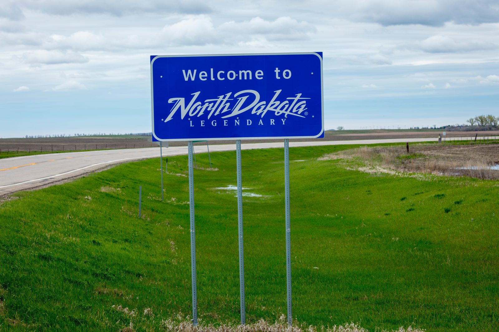 Welcome to North Dakota Legendary highway sign — North Dakota chiropractic CE requirements guide