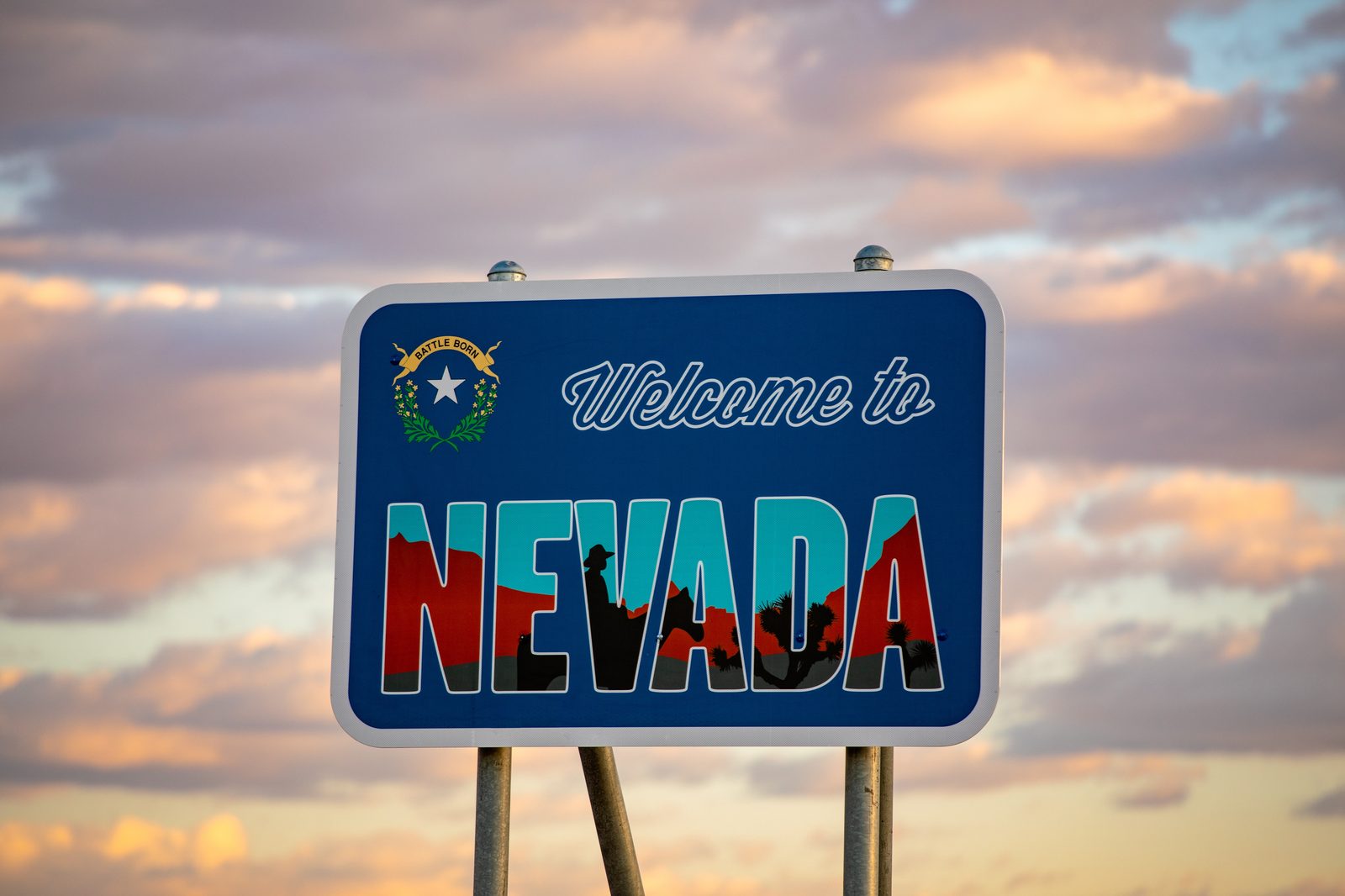Welcome to Nevada state sign at sunset — Nevada chiropractic CE requirements guide, CCEDseminars
