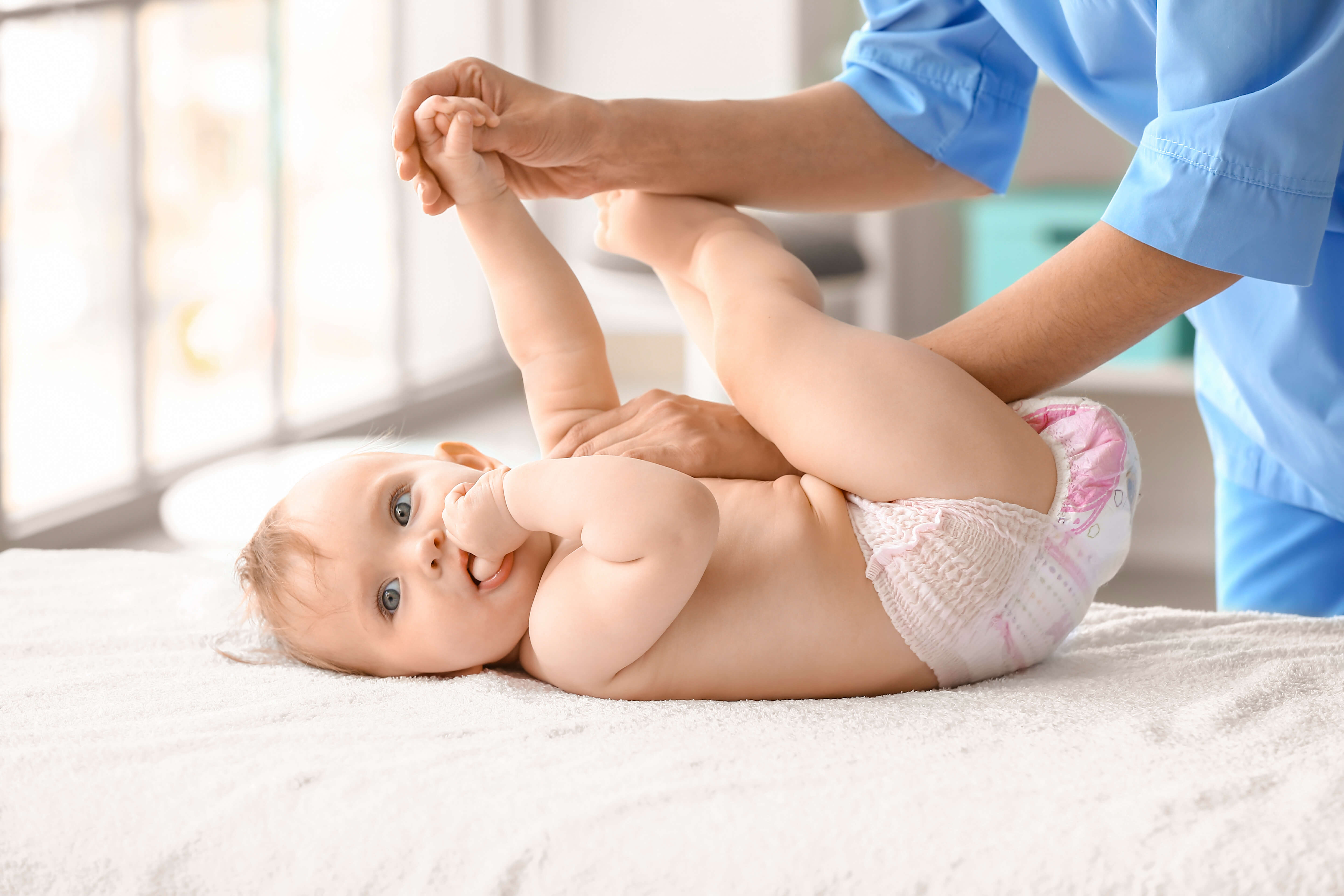 image of infant palpation on our chiropractic ceu online page
