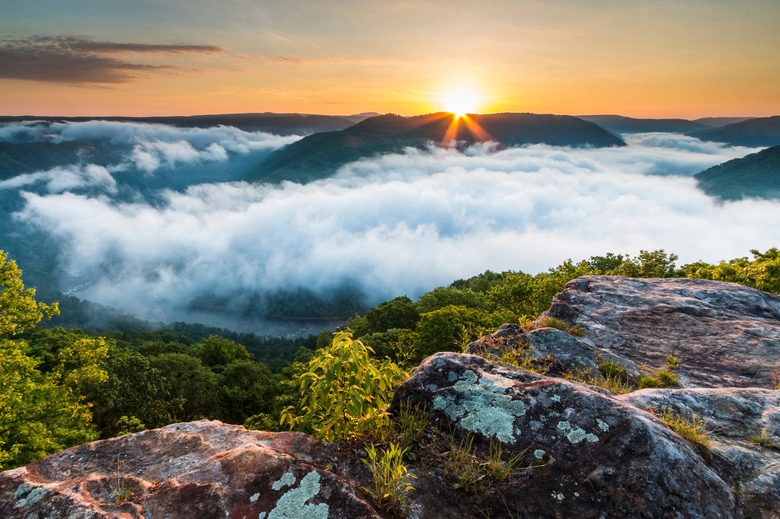 Sunrise over a fog-filled Appalachian river gorge — West Virginia chiropractic CE guide, CCEDseminars