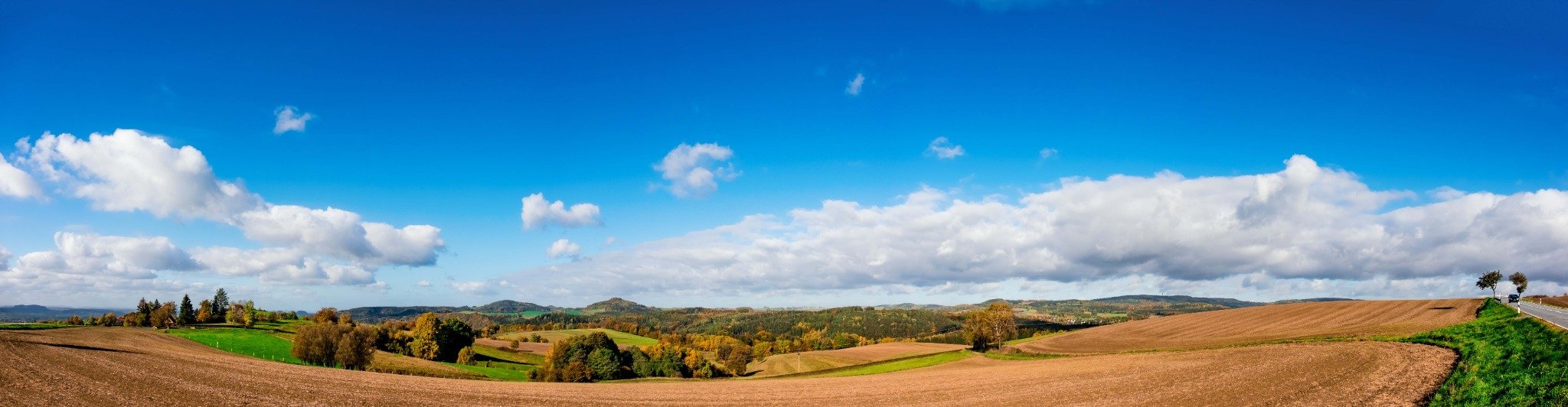 Scenic Kansas farmland and blue sky representing Kansas chiropractic CE requirements