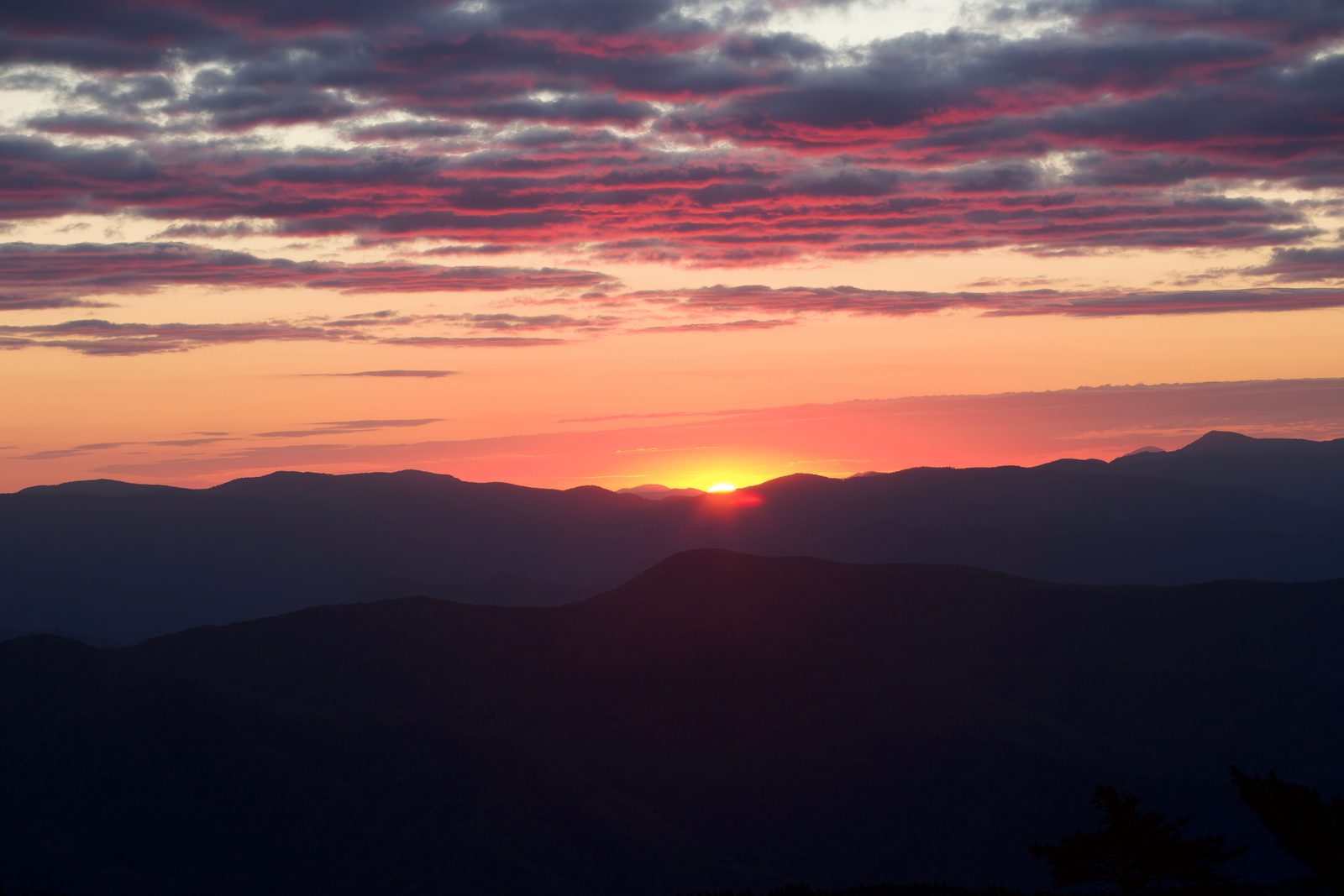 Layered mountain ridgelines at sunset in East Tennessee — Tennessee chiropractic CE requirements guide