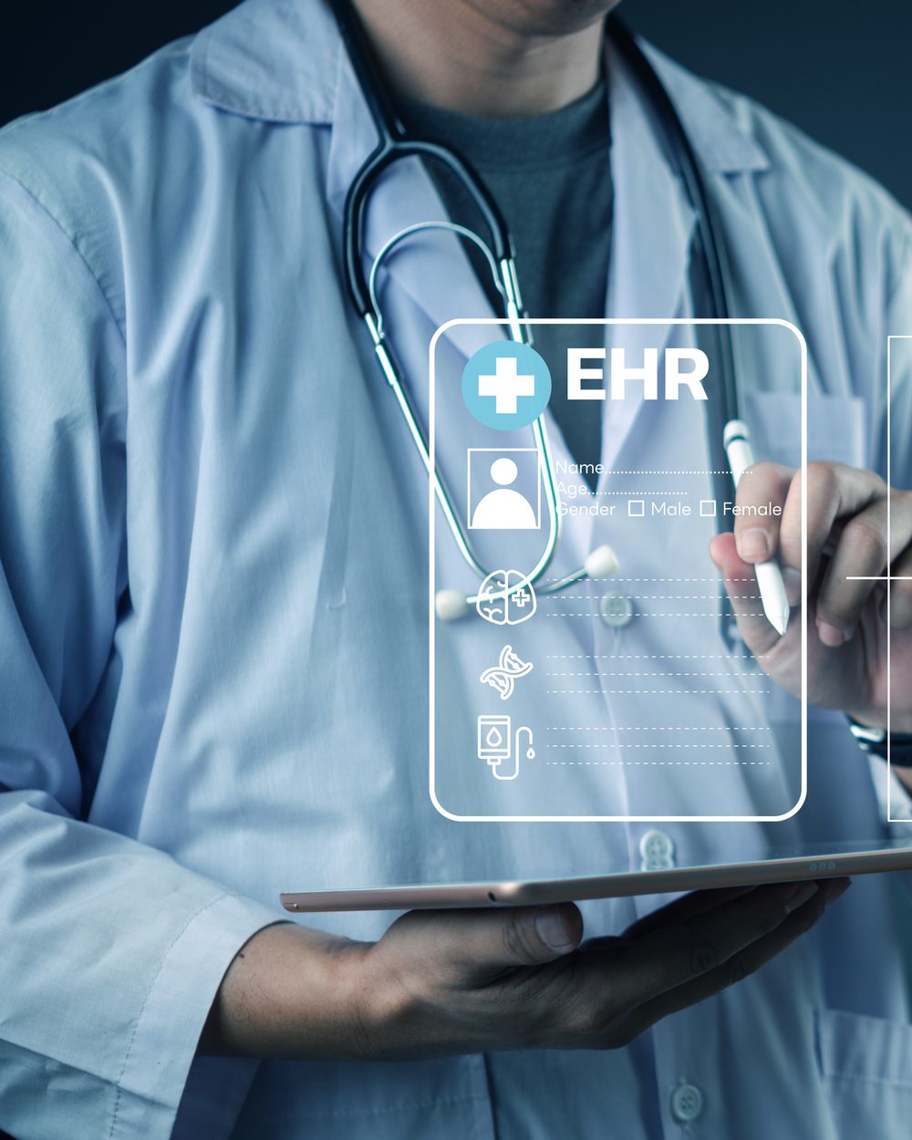 Clinician completing an electronic health record on a tablet with stylus — chiropractic coding and documentation CE courses; CCEDseminars category page