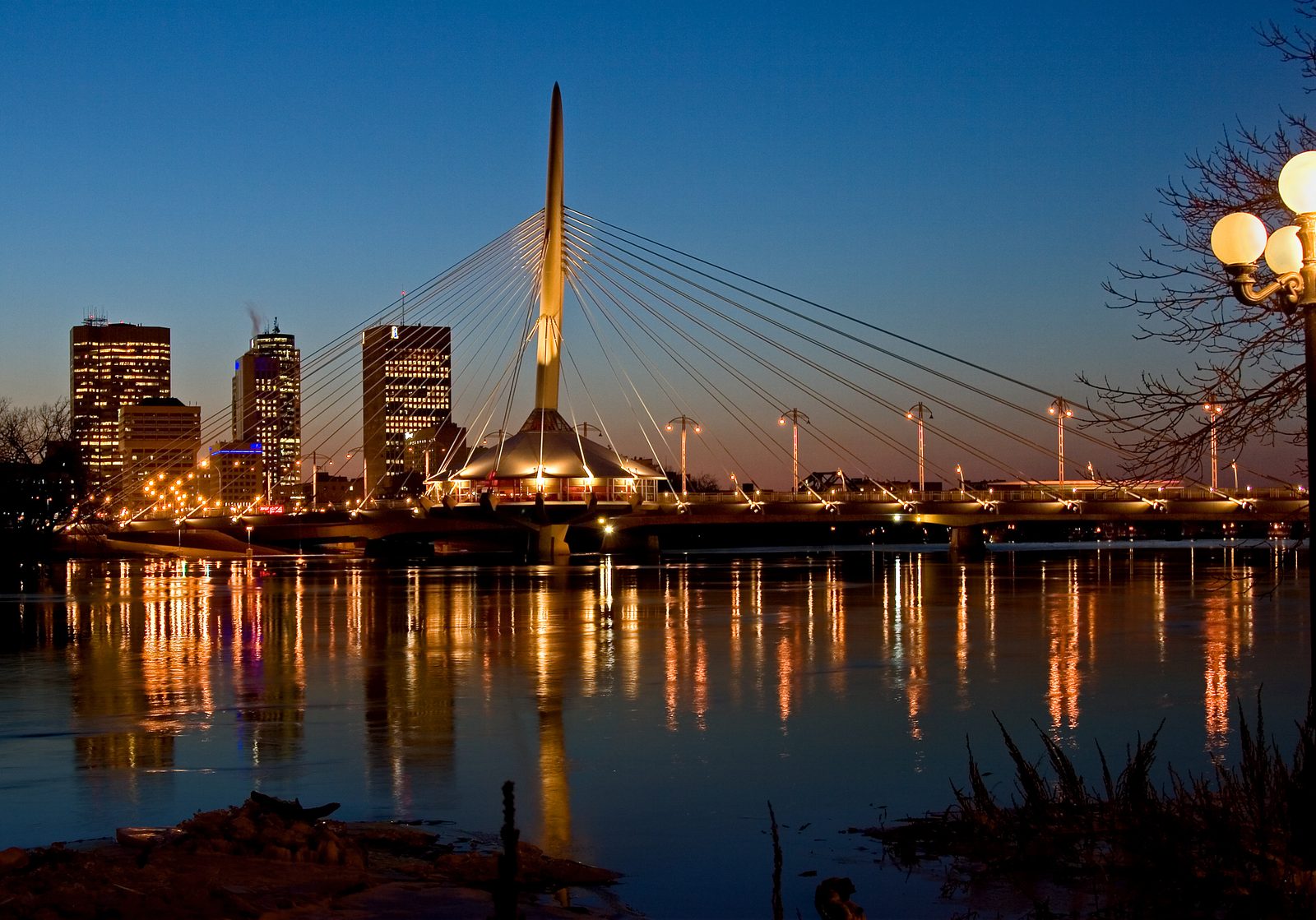 Winnipeg skyline and Esplanade Riel at dusk, Manitoba — Manitoba chiropractic continuing education guide
