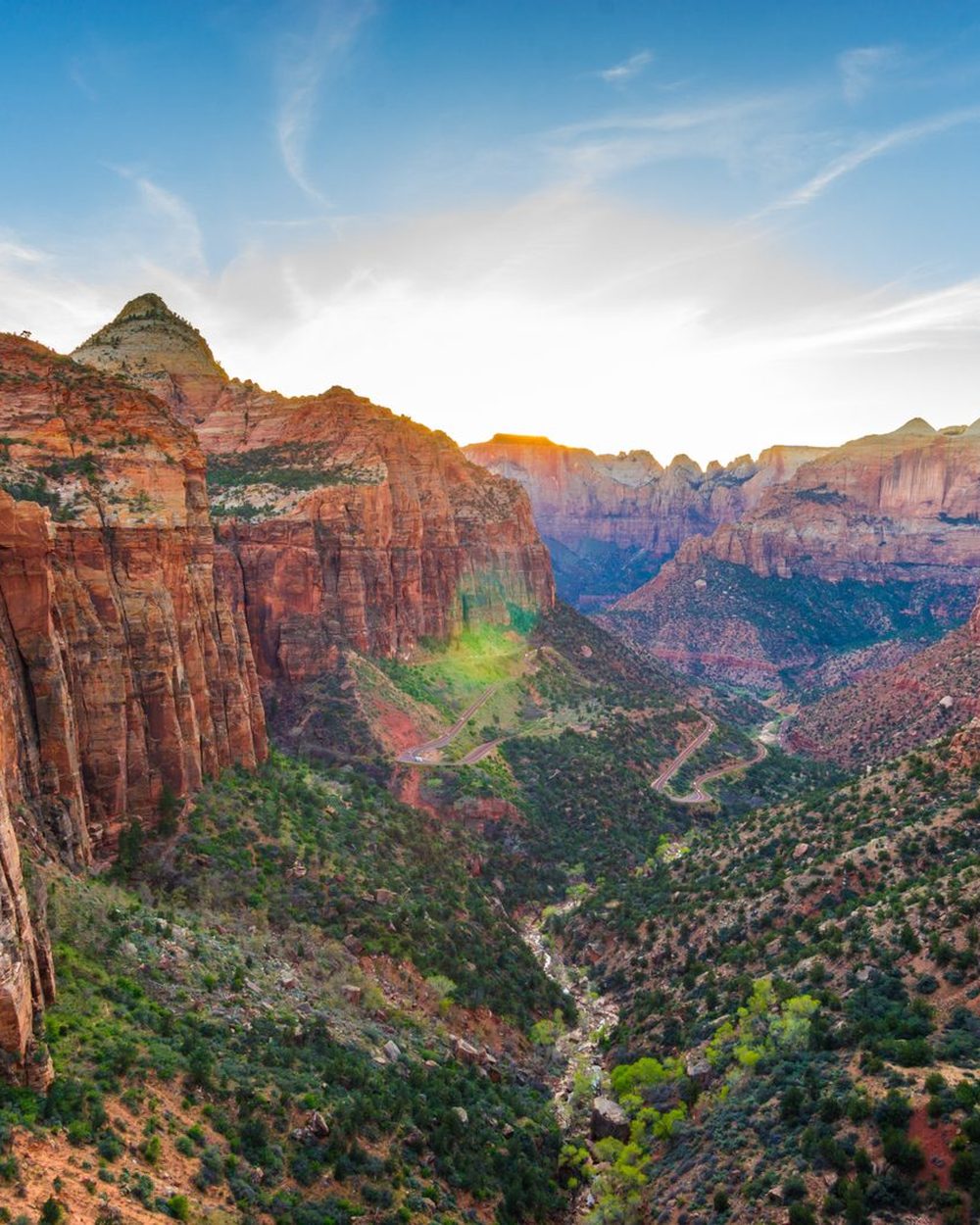 Zion Canyon overlook at sunset with red rock walls and the winding valley road — Utah 10-hour distance-learning maximum chiropractic CE bundle, R156-73-303b, CCEDseminars