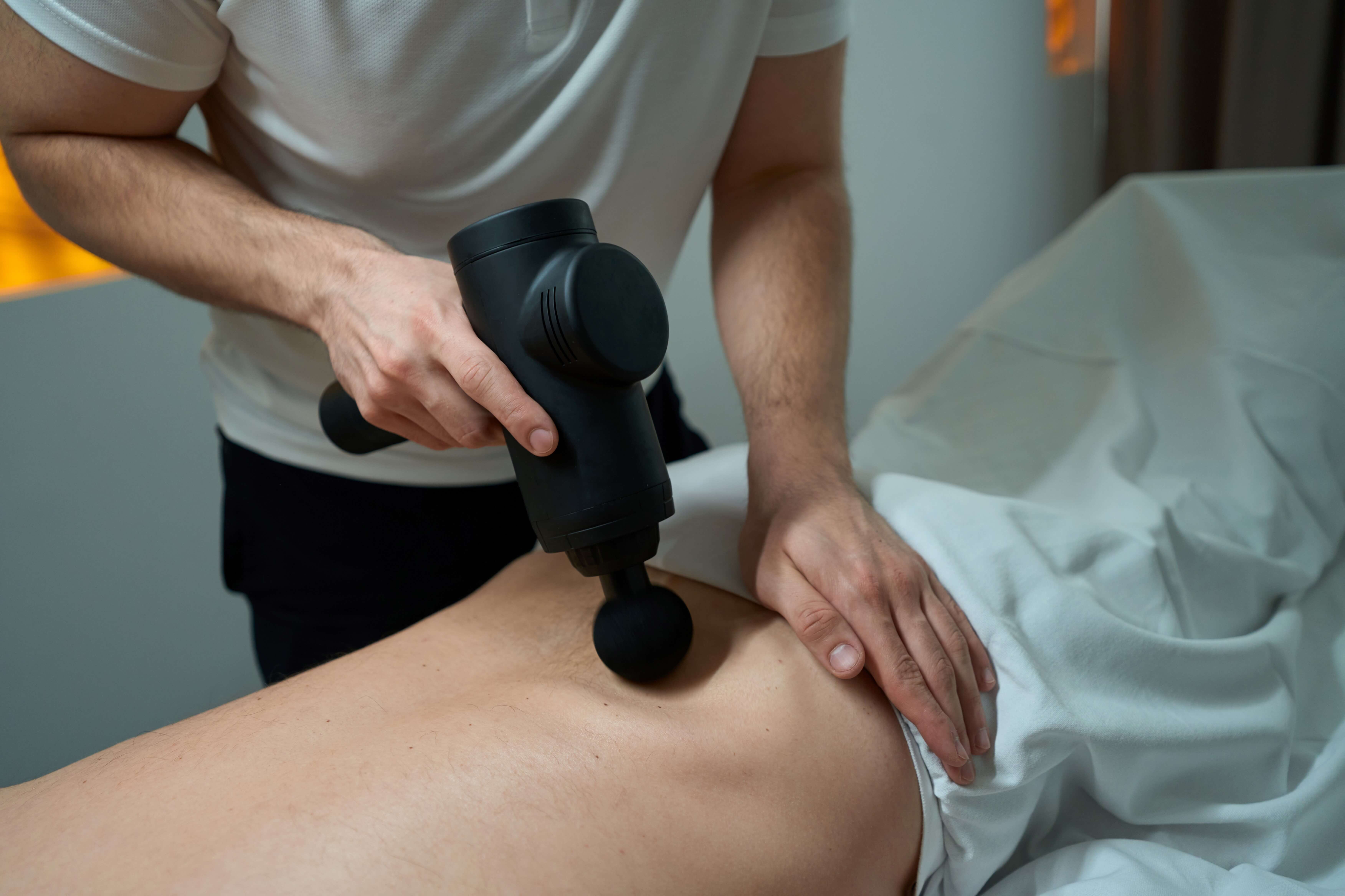 image of percussive massage on our chiropractic ceu page