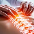 A professional clinical photograph for CCEDseminars' Course 205. A chiropractor's hand points to a tablet screen displaying 'Evidence Based Practice 205: Modes of Care' and 'MANUAL THERAPY & CLINICAL EFFICACY.' The interface features a comparative evidence chart of manipulative therapy versus non-articular techniques, reflecting the evidence-based treatment protocols taught by Dr. Monte Horne.